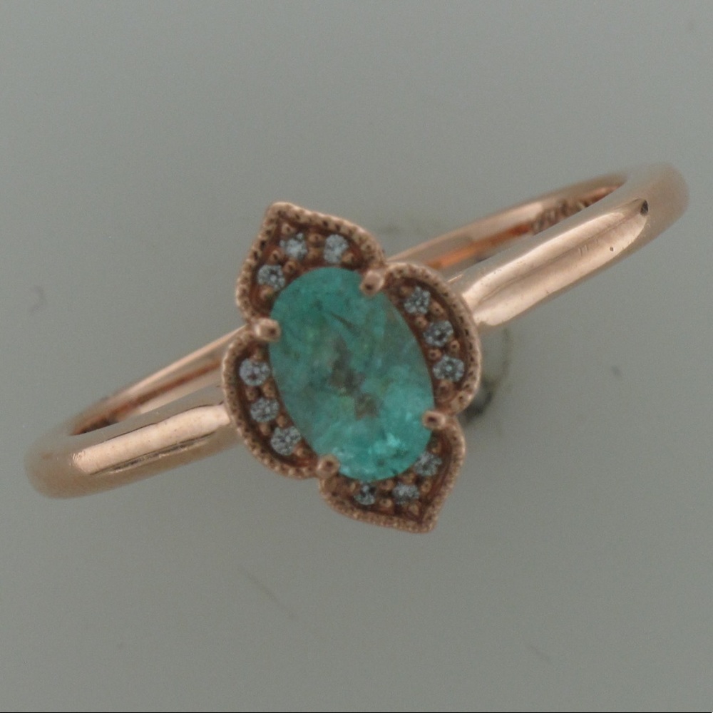 14kt rose gold tourmaline and diamond ring.